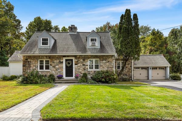 Charming stone and stucco Cape Cod located in the Mortgage Hill sectio...