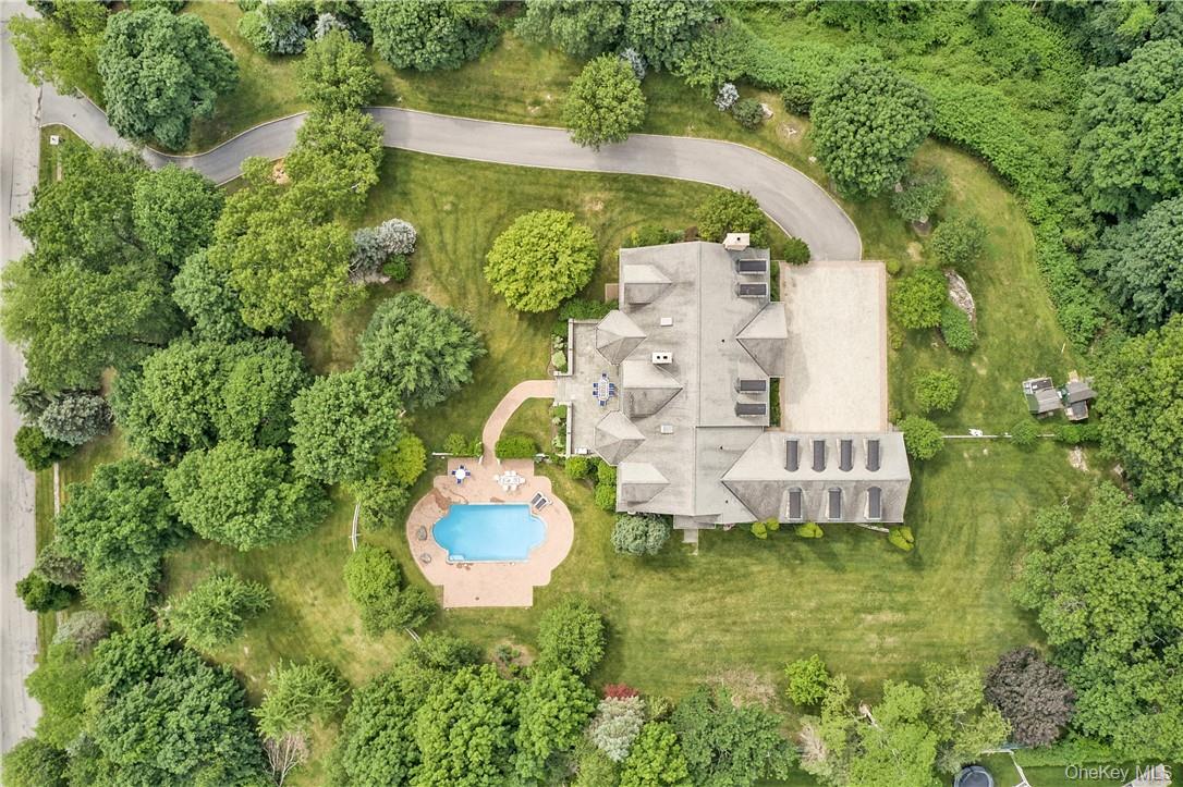This stately brick Colonial seamlessly combines elegance and functiona...