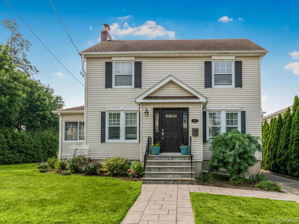 Classic Center Hall Colonial on beautiful oversized property located i...