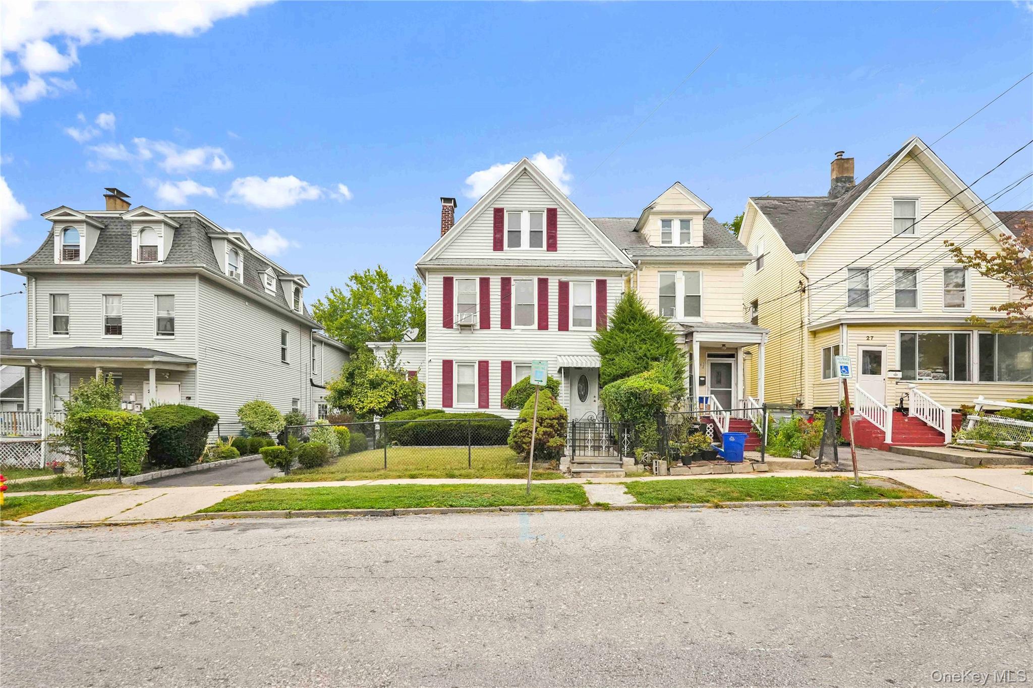 This spacious three-family home in Ossining offers three full stories...