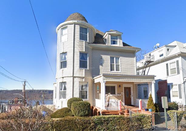 Welcome to this stunning Victorian-style multi-family home in the hear...