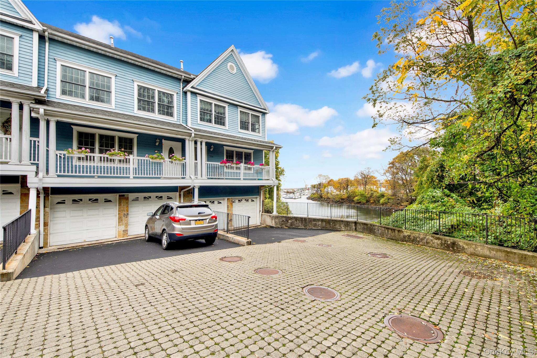 Welcome to Neptune Pond — a boutique 5-unit condominium offering effor...