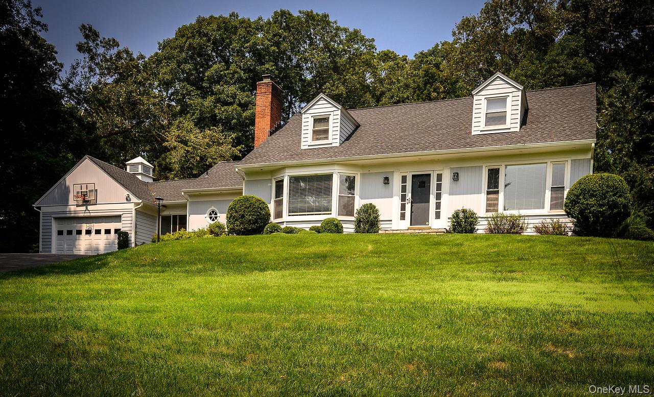 Set on a quiet cul-de-sac, this charming 3-bedroom Cape, which could l...
