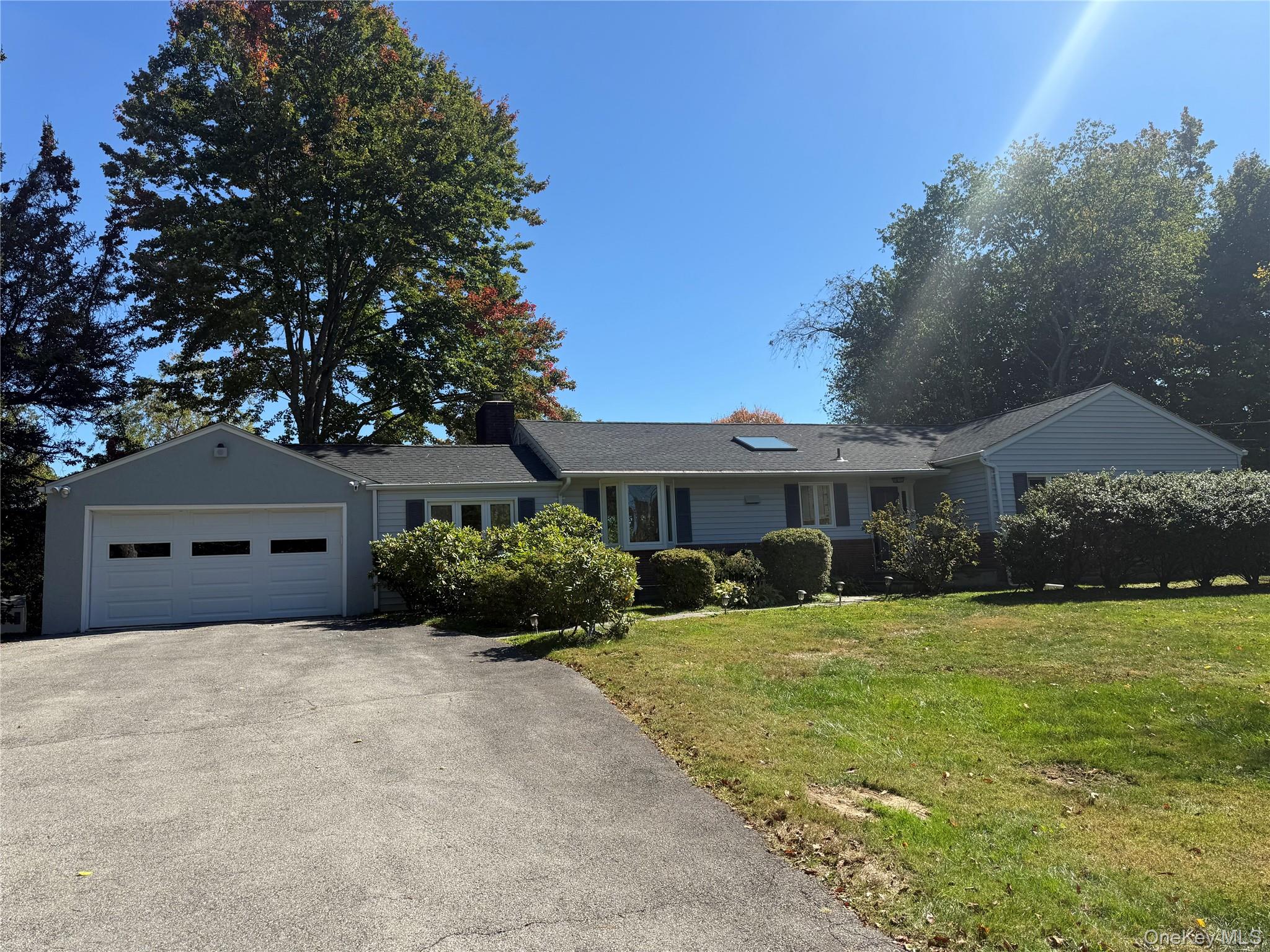 Welcome to 18 Adams Road! This charming property is tucked away on a q...