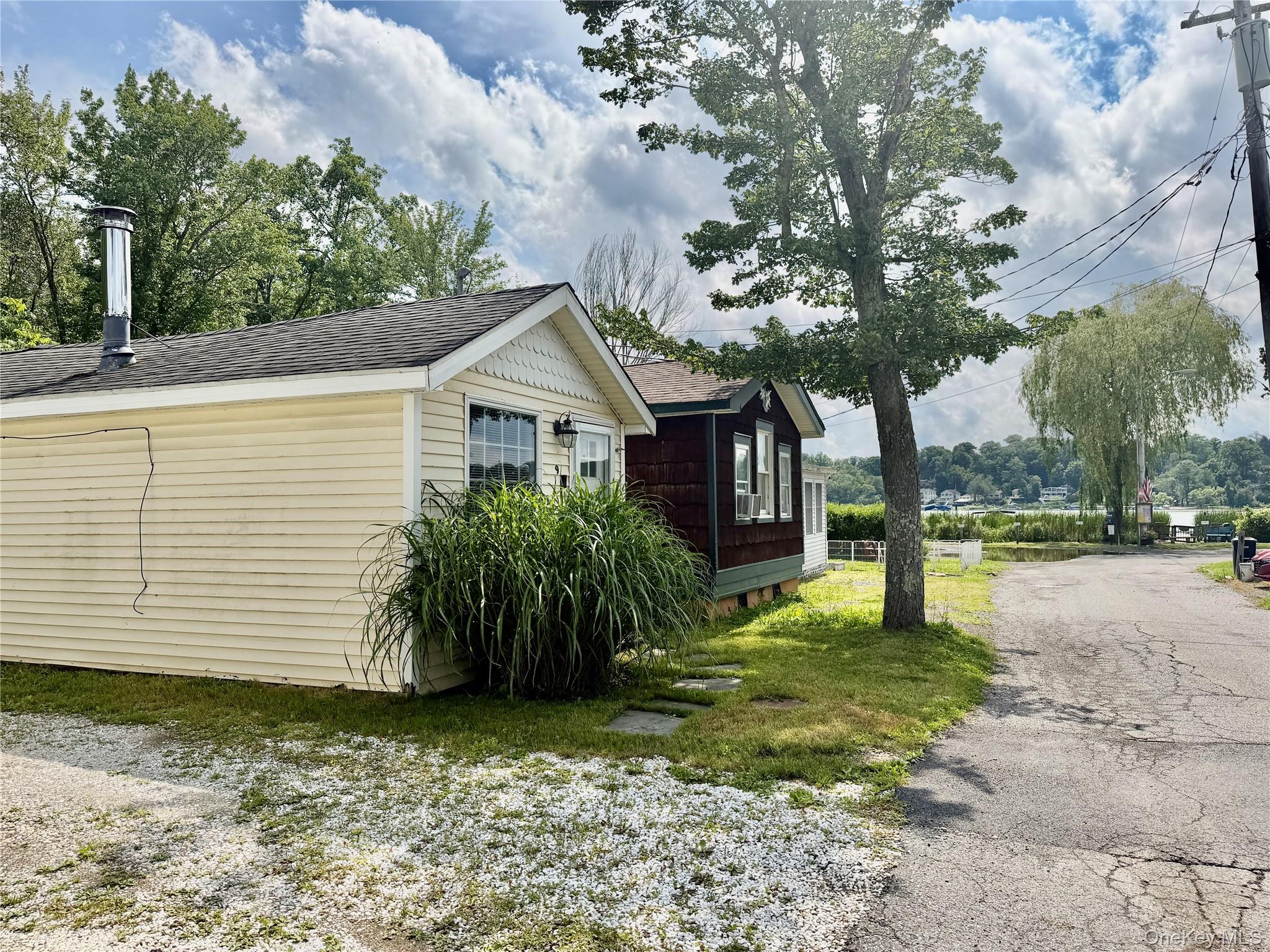 Enjoy this Cozy 1 Bedroom Dream Home in a Lovely Lake Front Community...