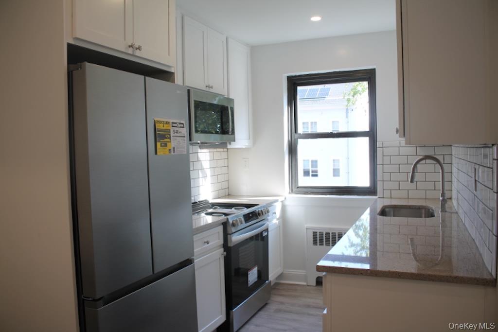 FREE PARKING FOR ONE YEAR--ASSIGNED SPACE......STUNNING RENOVATION--AL...