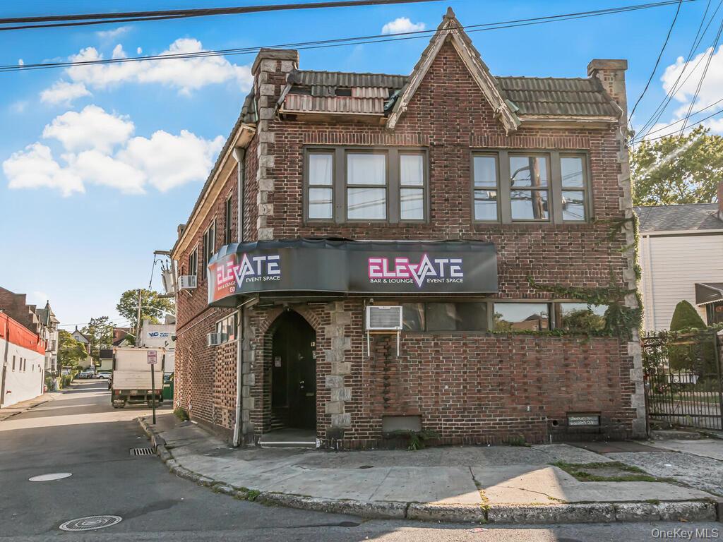 Prime Location!! Welcome to Elevate Bar & Lounge! Corner Brick Buildin...