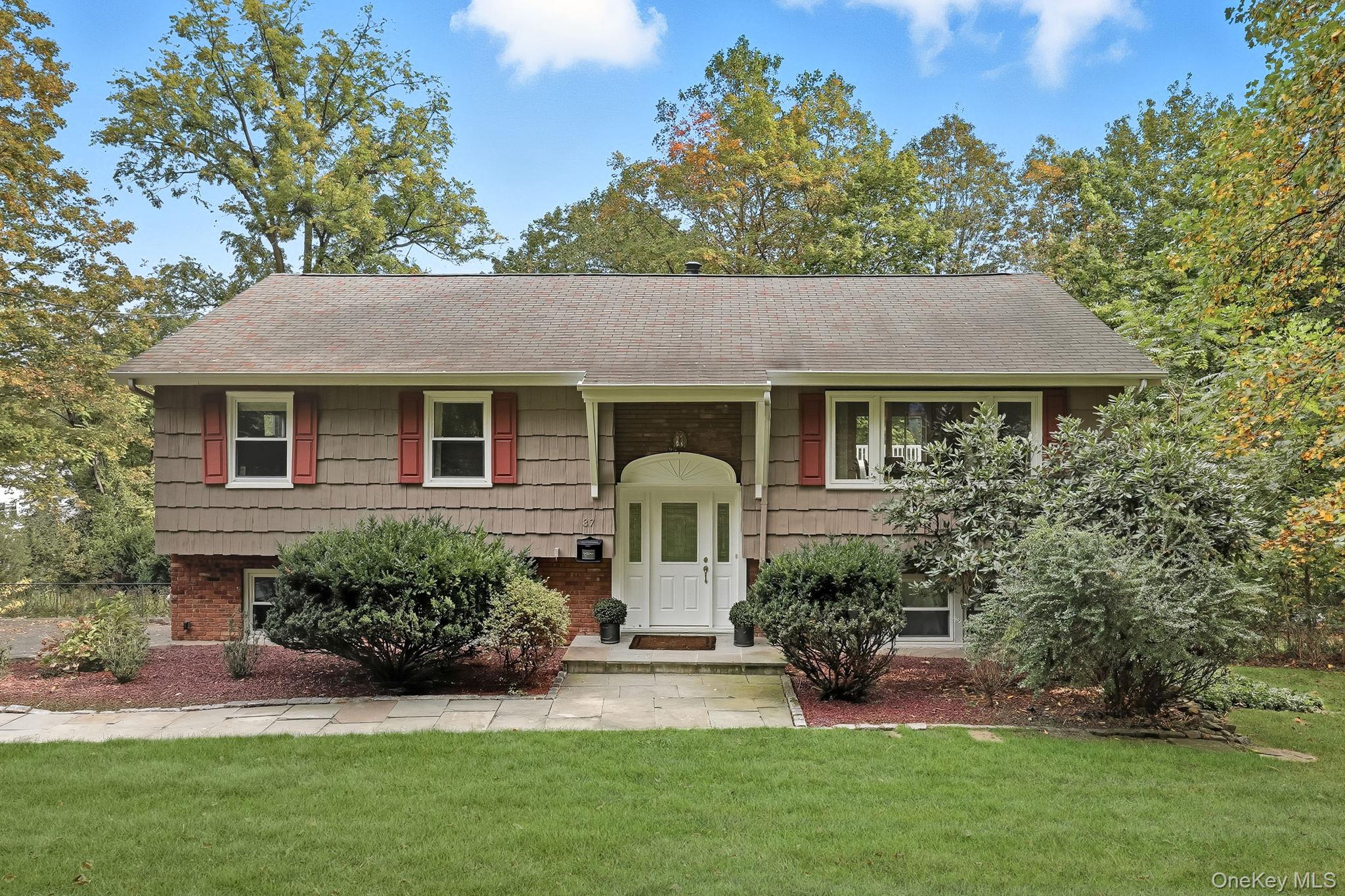 Beautifully renovated 4-bedroom, 3-bath home on a lush, private half-a...