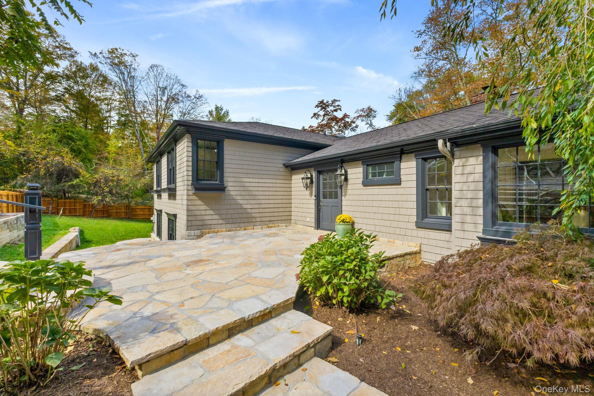 Stunning and elegant 5 bedroom/5.5 baths ranch style home plus detache...