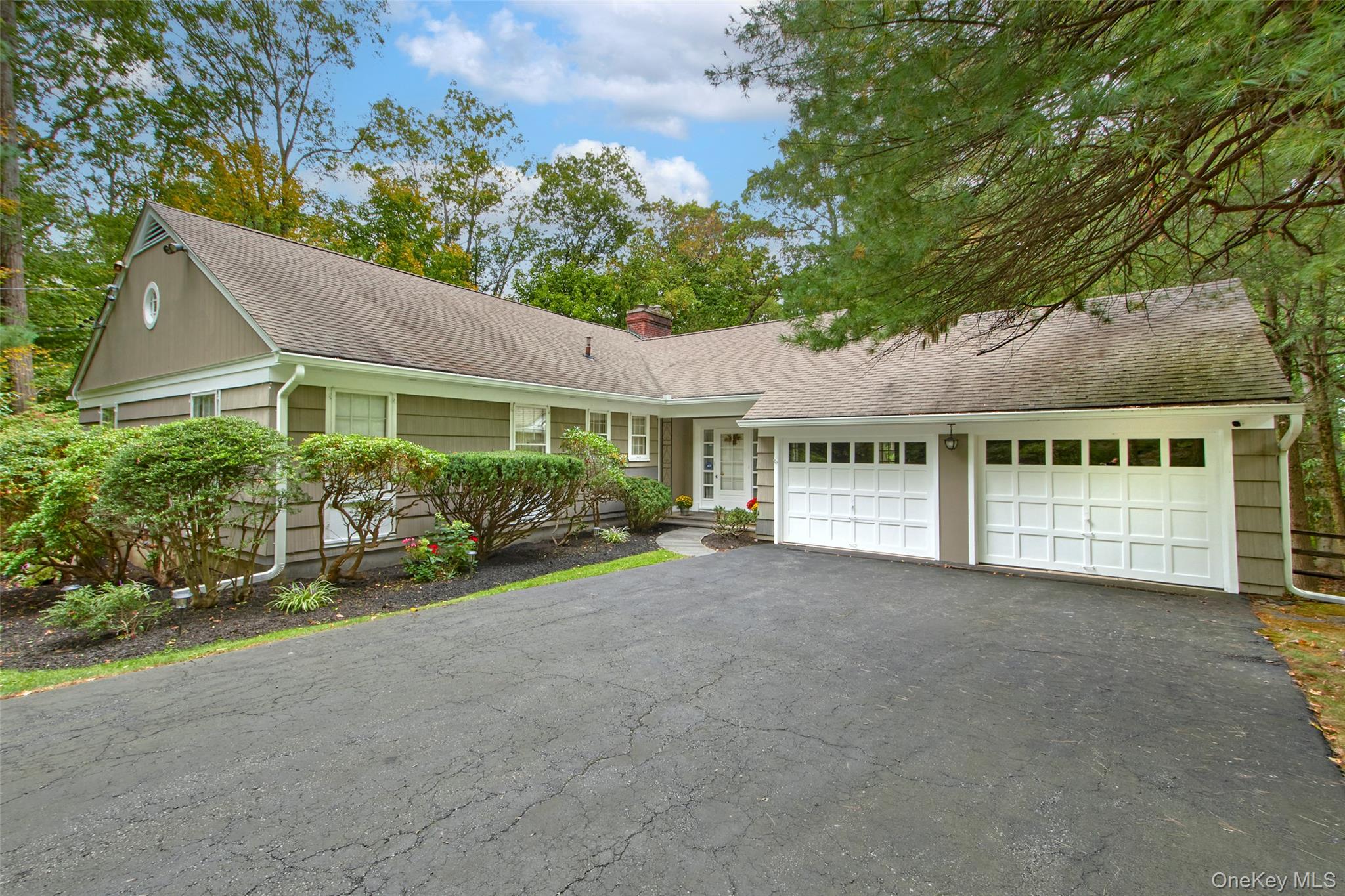 Perfectly positioned on a serene and private 1.72 parcel in the sought...