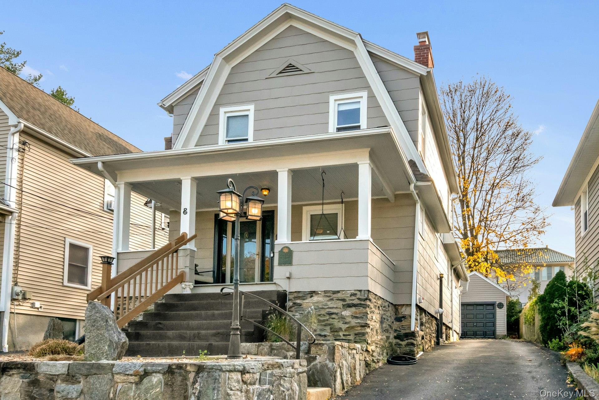 This Charming Village Colonial comes complete with a classic front por...