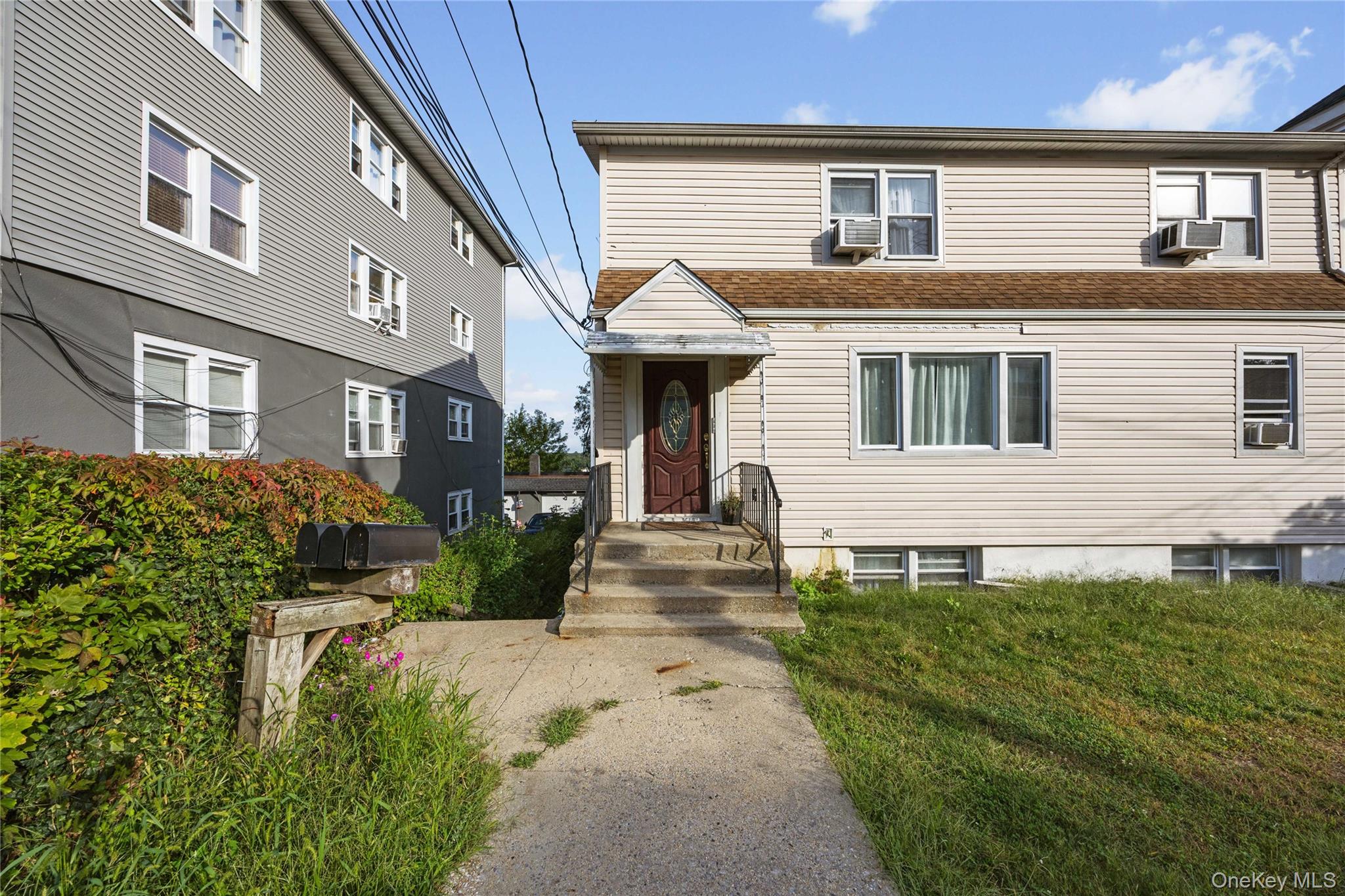 Welcome to 26 Portland Place in Yonkers, NY — a fully renovated 3-fami...