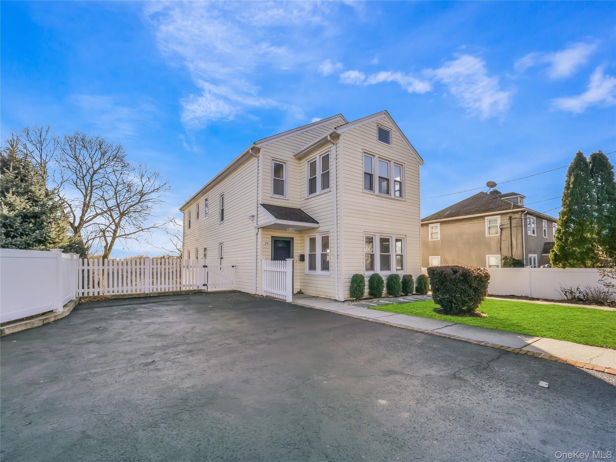 Beautifully renovated 3 Bedroom/2 Full Bath in a 2 Family Townhome.  K...