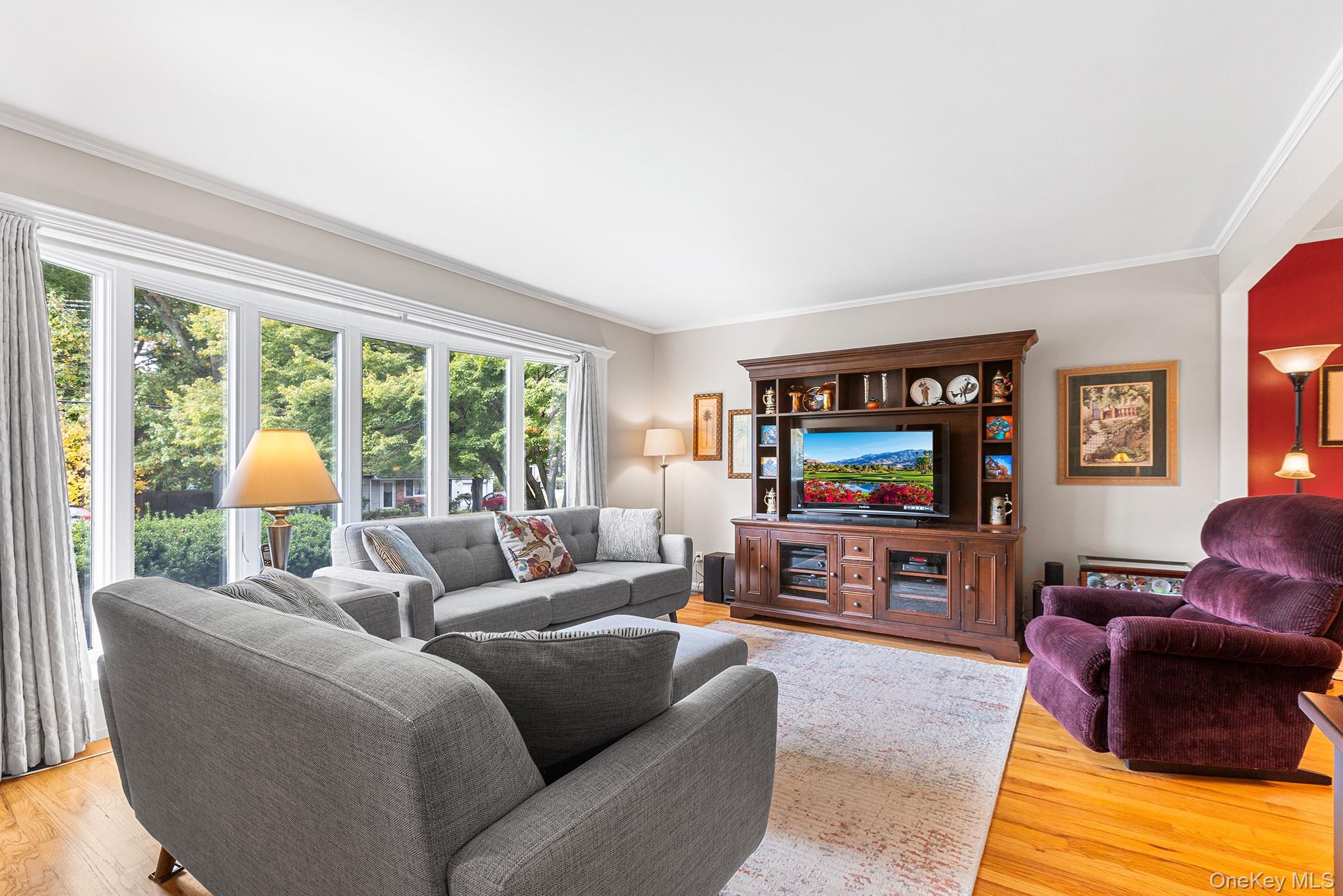 Located along a peaceful cul-de-sac in Ossining, there is a quiet grac...