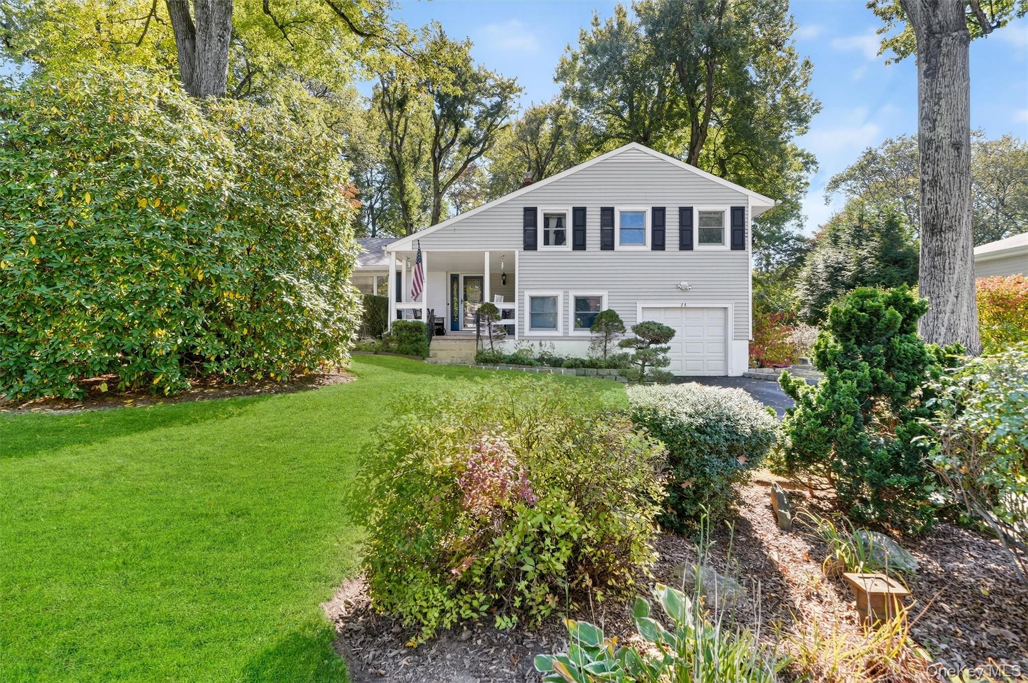 Situated perfectly on a park like half acre, this stunning Mid Century...