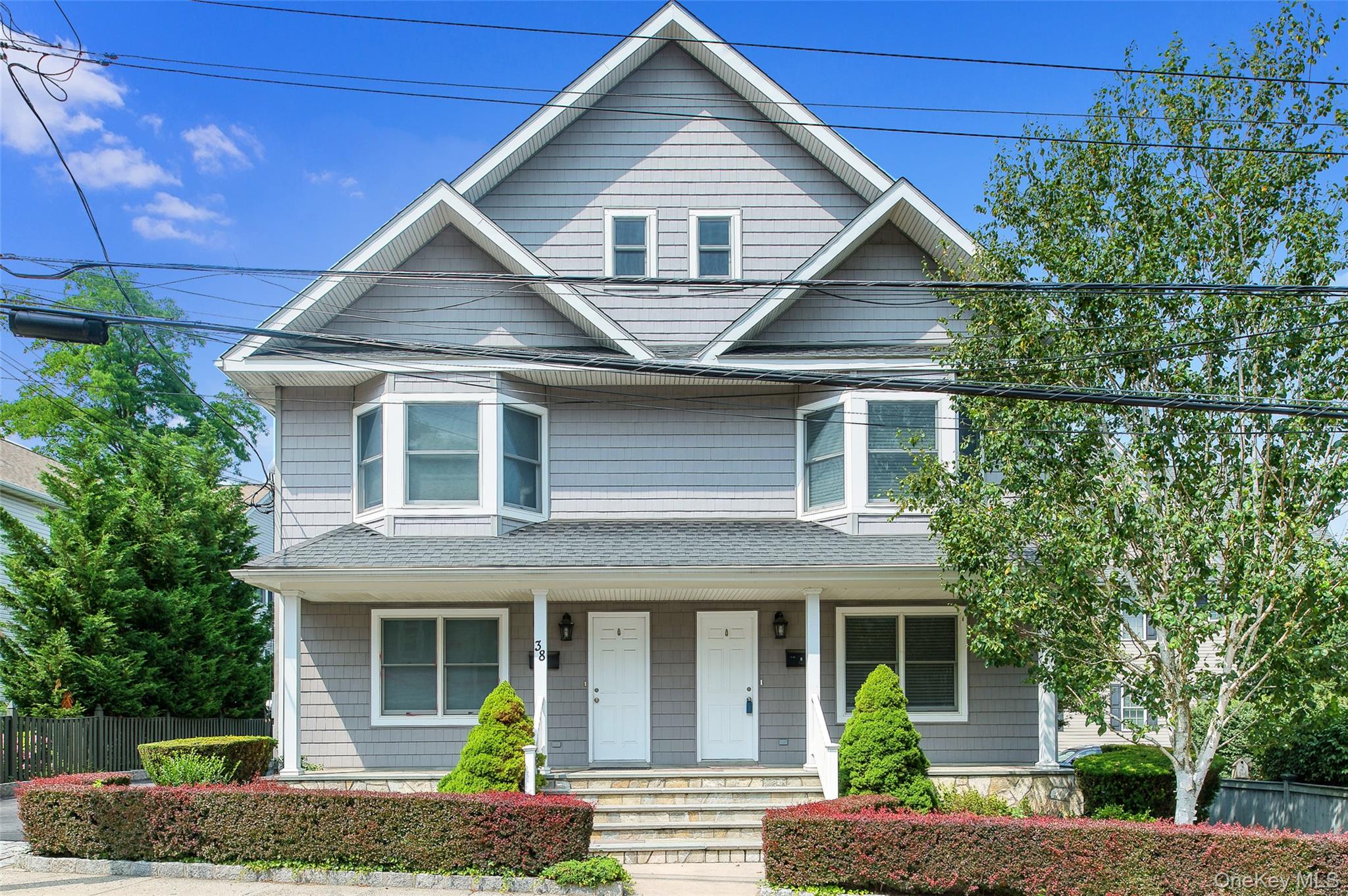 Beautifully maintained and move-in ready, this light-filled townhouse...