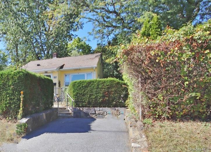 Cozy One-Level Cottage on a Quiet Dead-End Street. This inviting home...