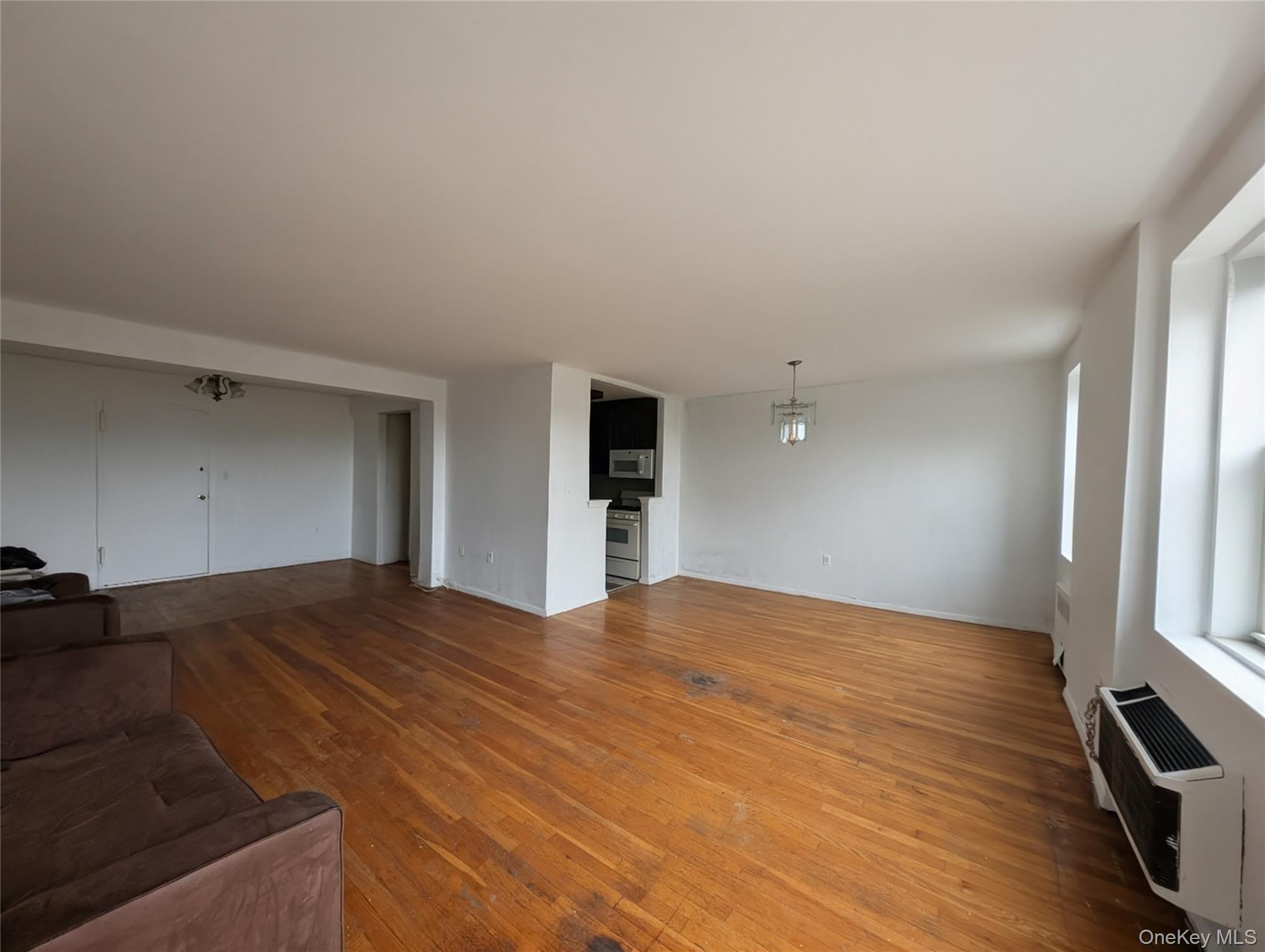 Welcome to this spacious and sun-filled 2-bedroom, 2-bathroom middle u...