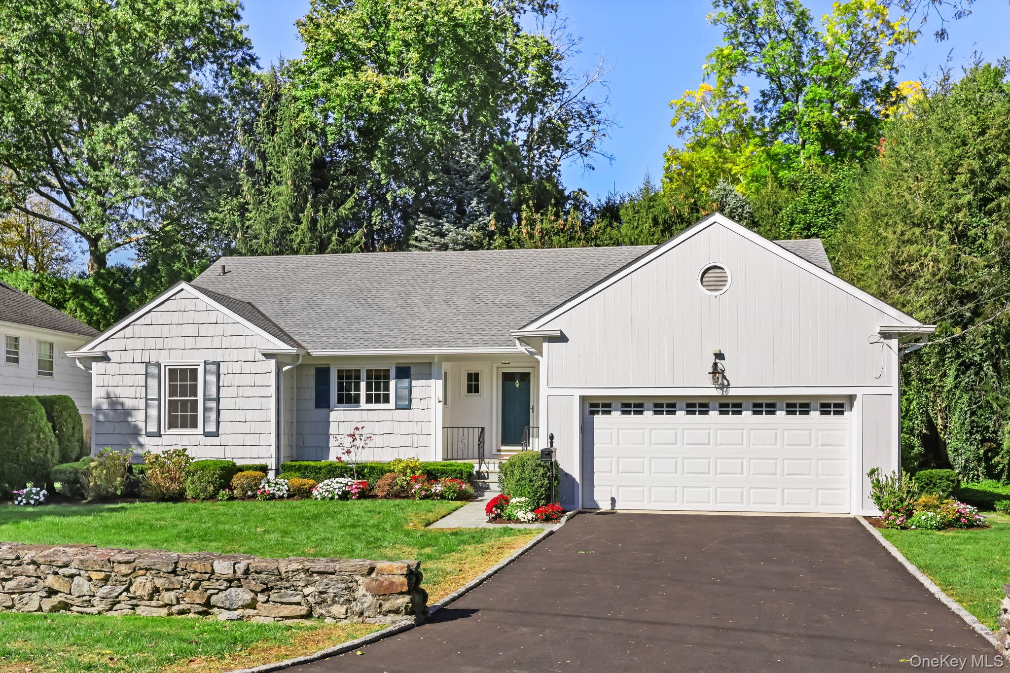 Bright and sunny Cape style home perfectly set on one of the best stre...