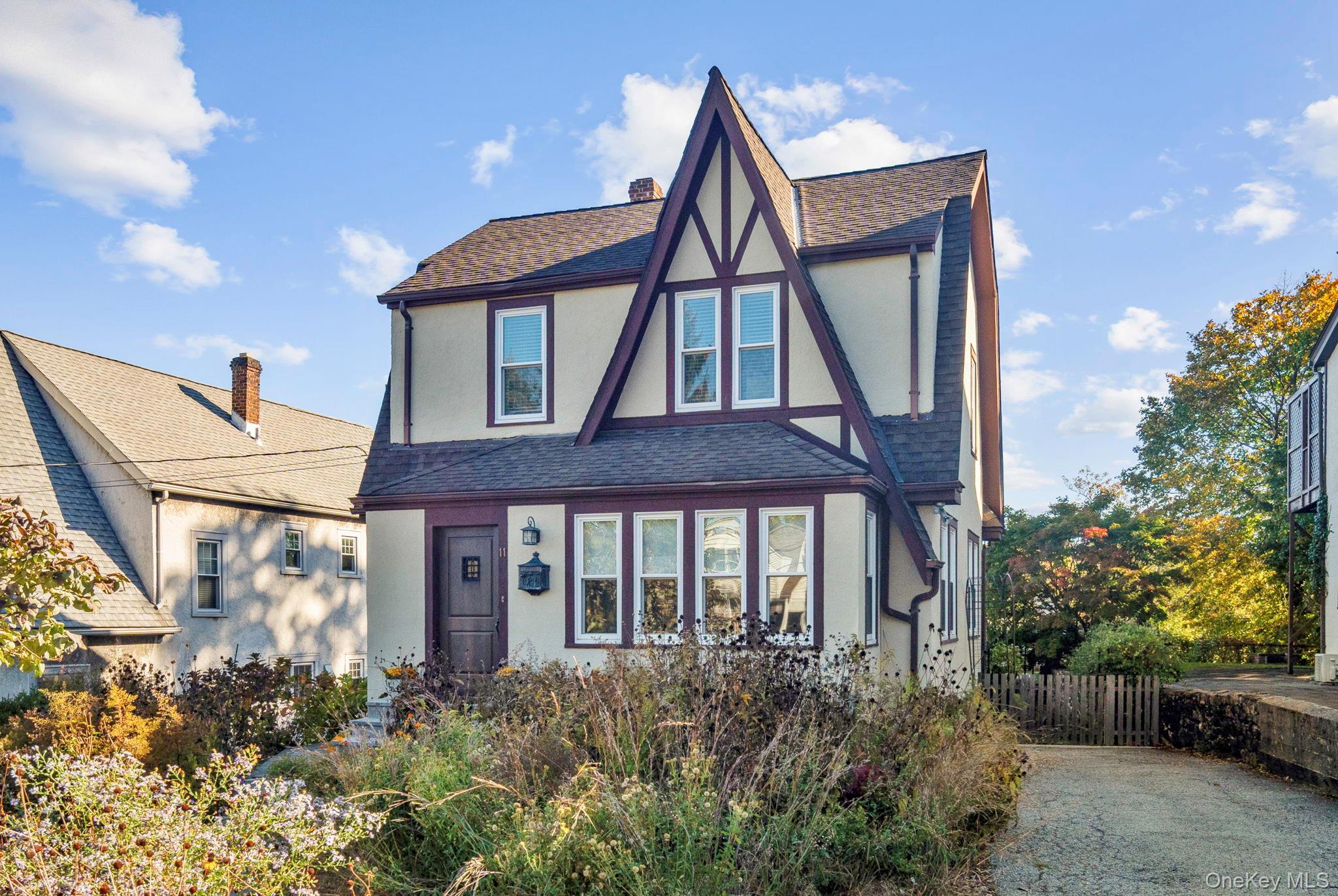 Step into timeless elegance with this 1931 Tudor, where old-world char...