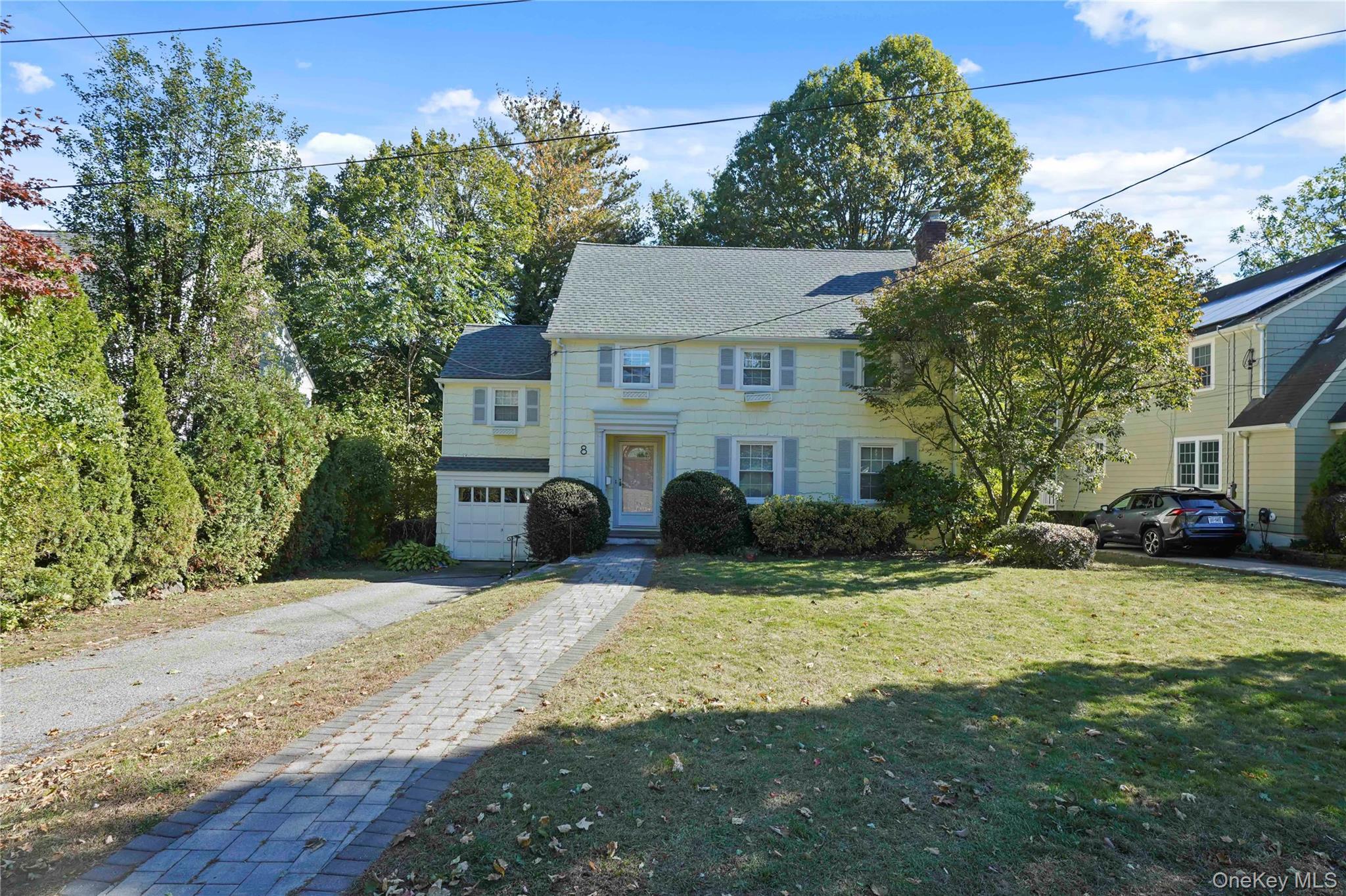 Welcome home to this classic colonial! The gracious foyer leads to a l...