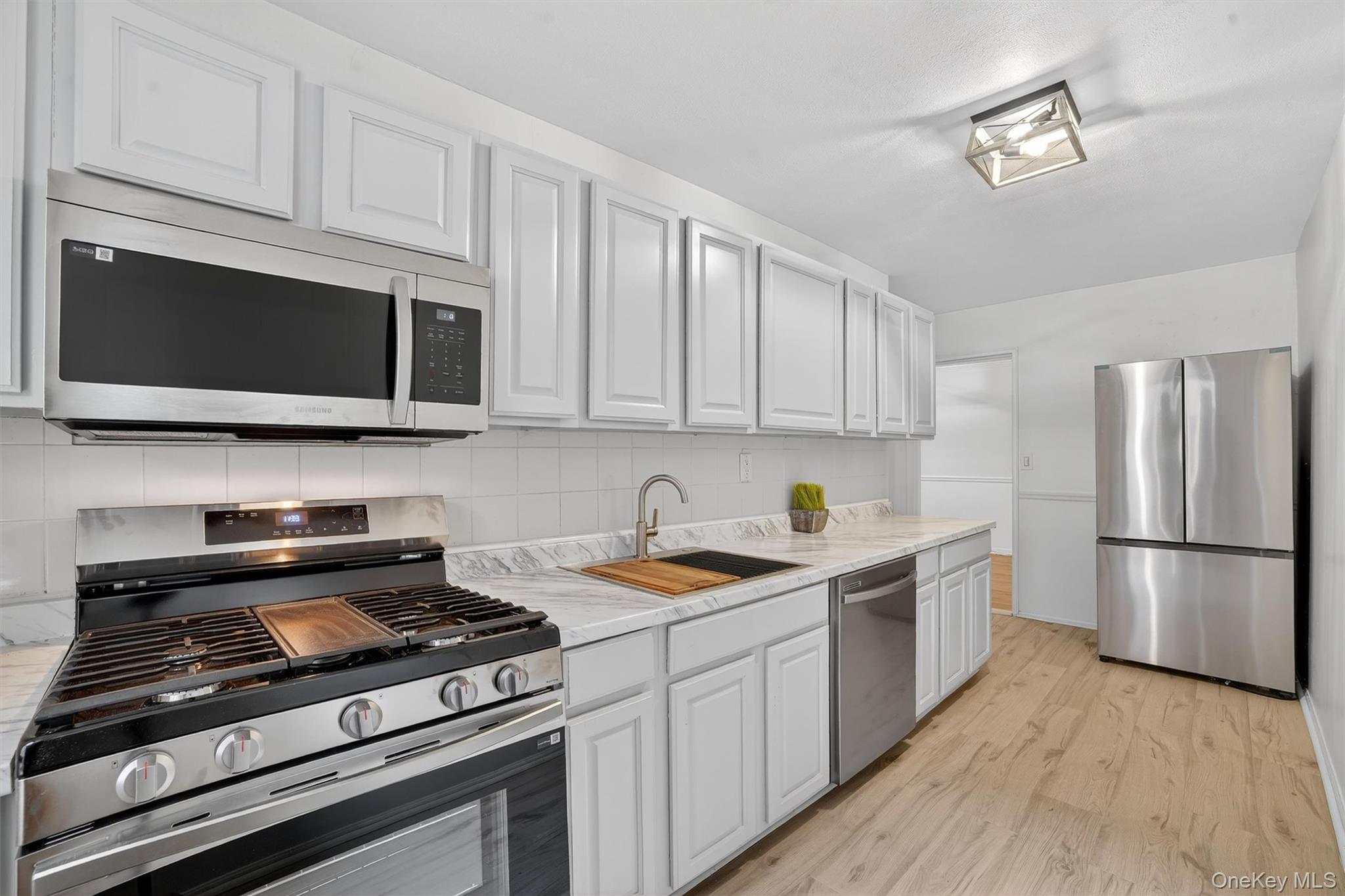 Welcome to 19 Old Mamaroneck Road and this PET FRIENDLY charming build...
