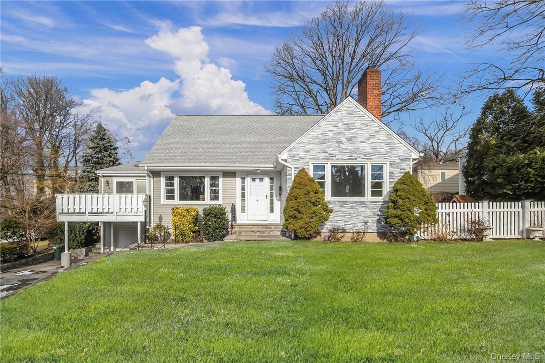 Bright, cheerful, and move-in ready! This sunny home is conveniently l...