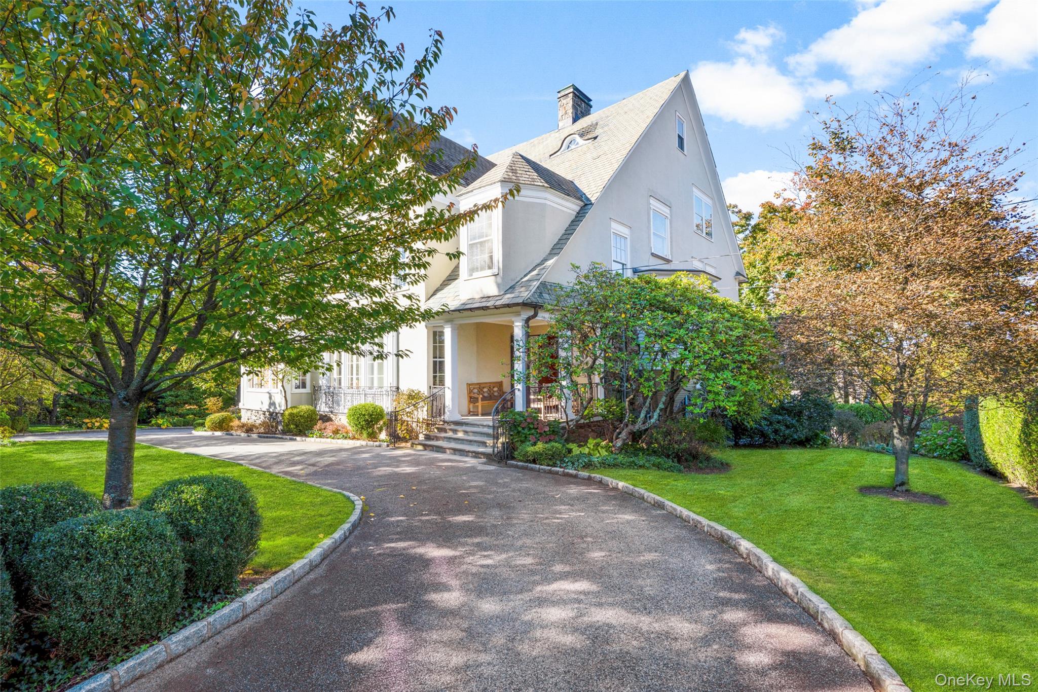 This hilltop estate in the heart of Pelham Heights is a statement home...