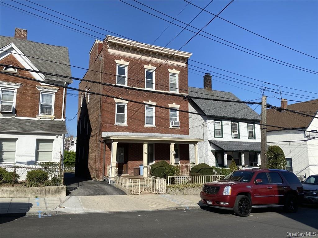 Three family brick home in the heart of the west end of New Rochelle....