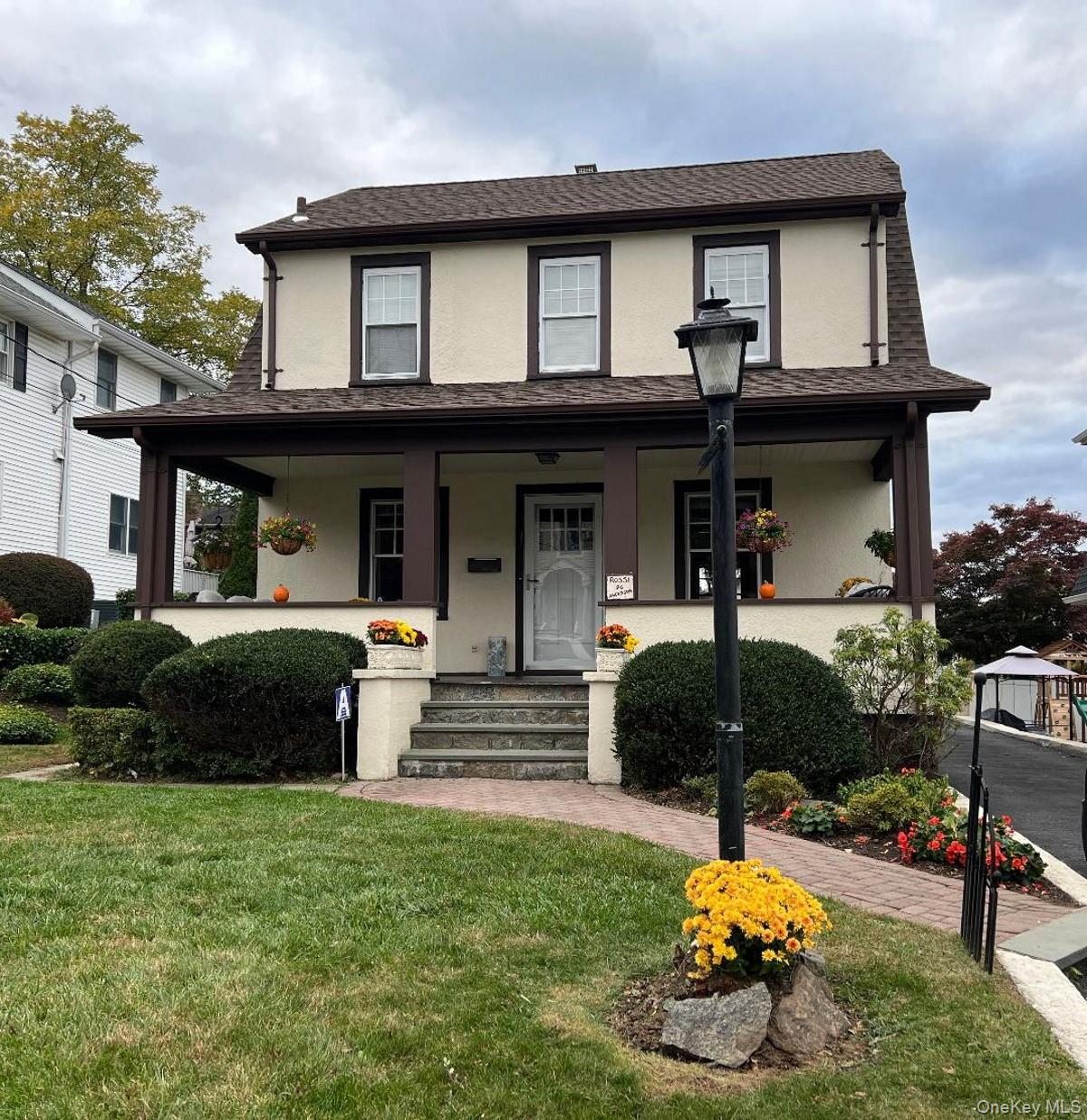 In an idyllic neighborhood that blends tree-lined tranquility with com...