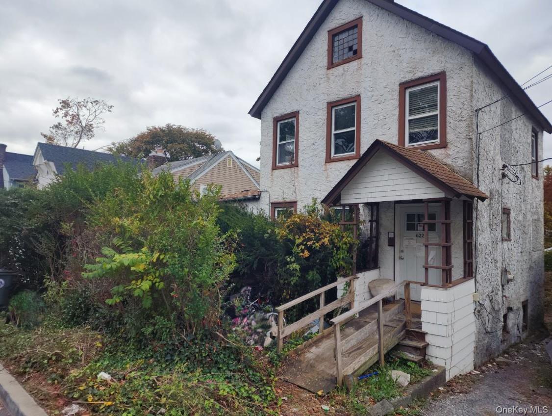 Opportunity knocks with this small home in need of a full renovation —...