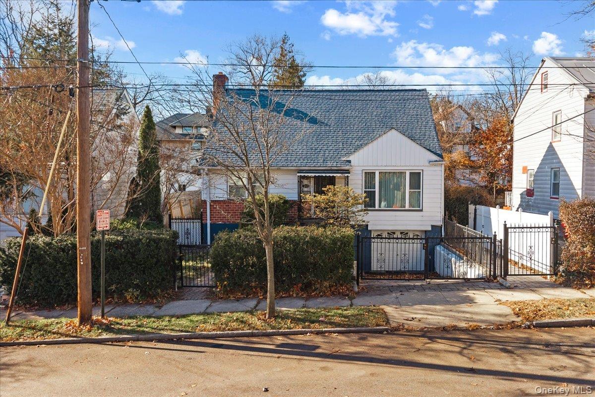 This beautifully updated 5-bedroom Cape Cod home welcomes you with a w...