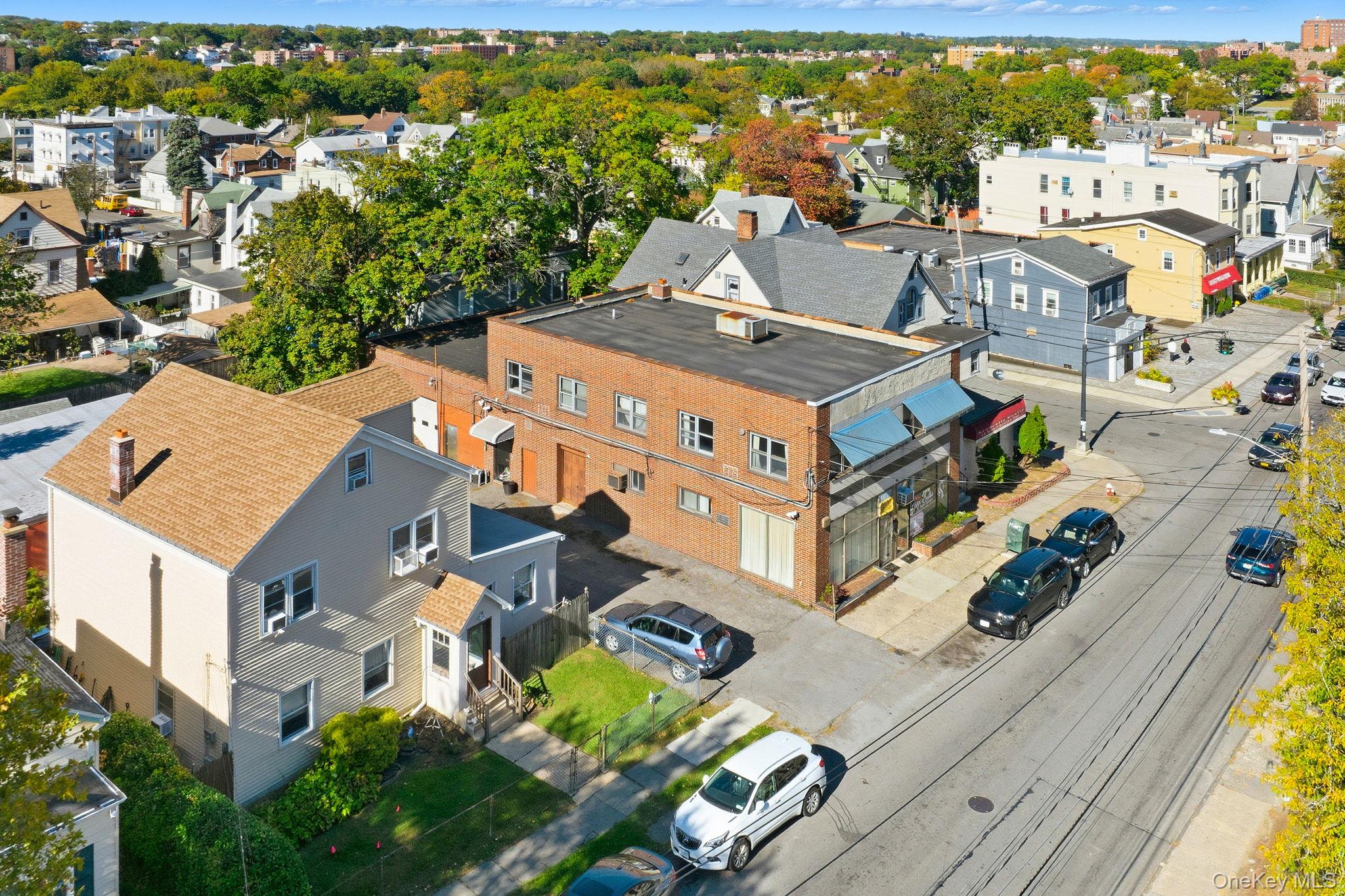 Excellent opportunity to own a mixed-use property featuring three sepa...