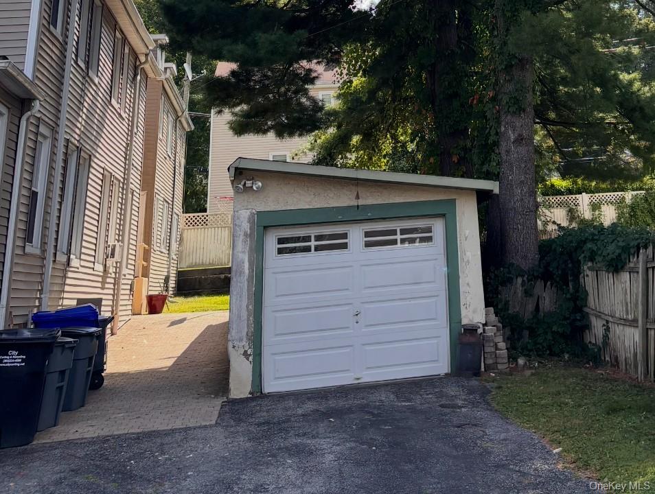 2 car tandem garage with 2 car driveway has seperate electric meter gr...
