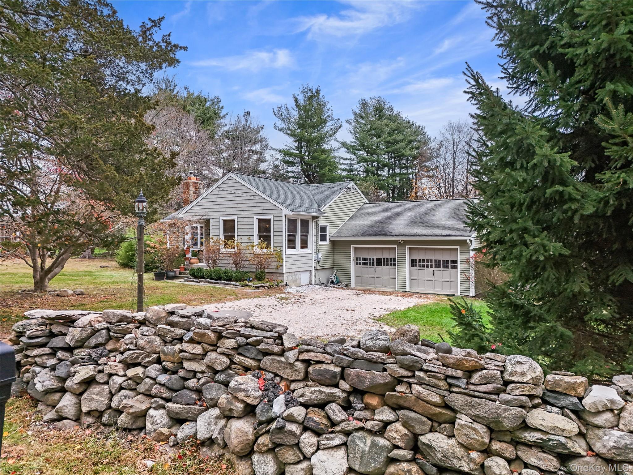 Discover this charming  South Salem farmhouse nestled on two beautiful...