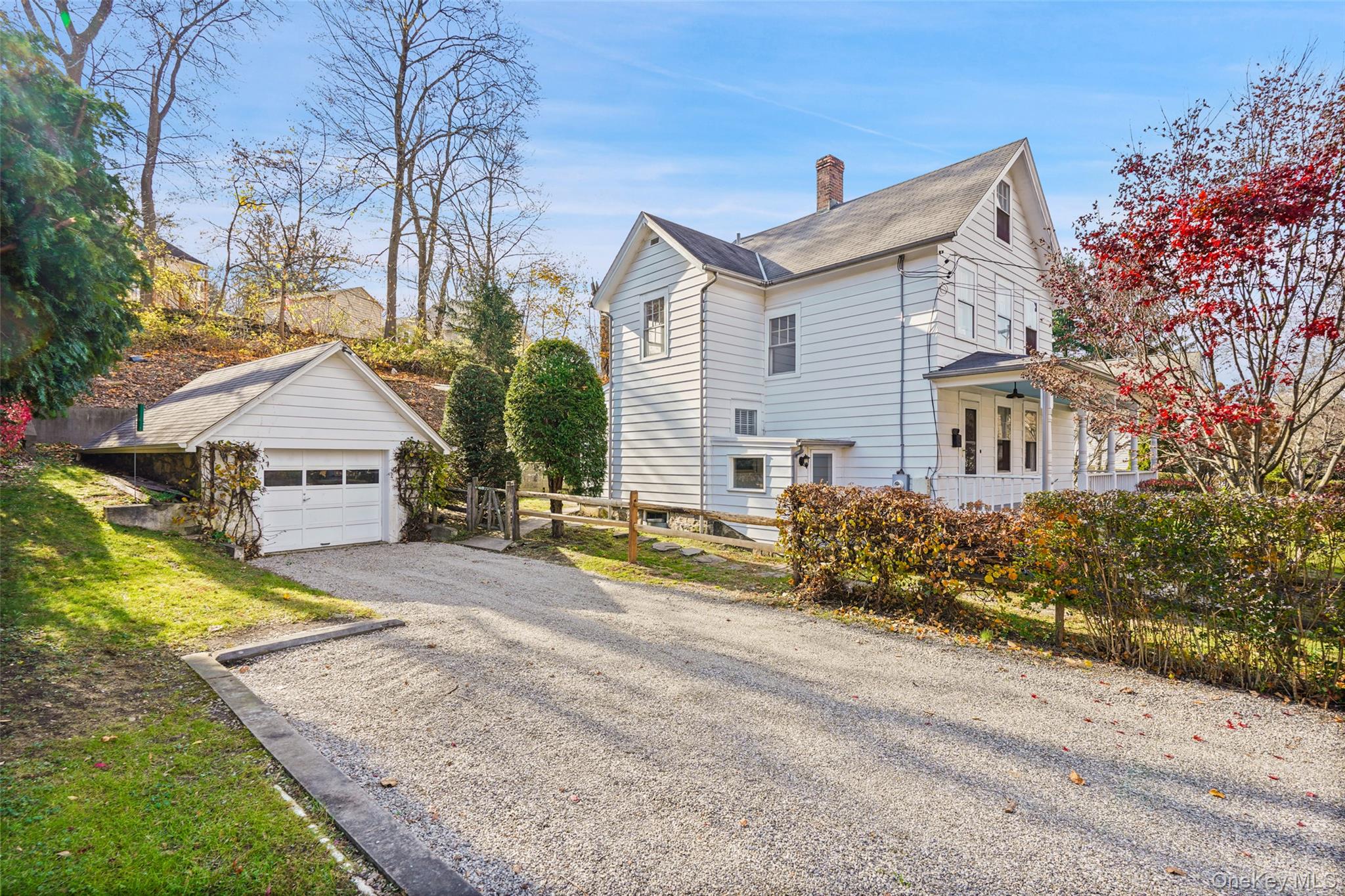 Charming 1900's side hall Colonial with rocking chair front porch.  Su...
