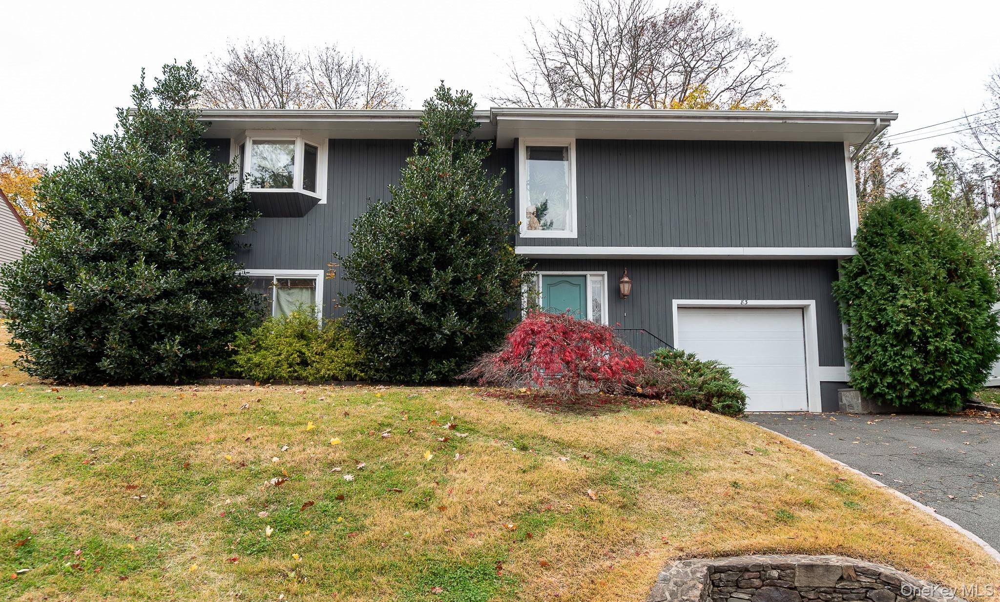 Welcome to 83 Edgepark Road, White Plains, NY 10603 — a beautifully de...