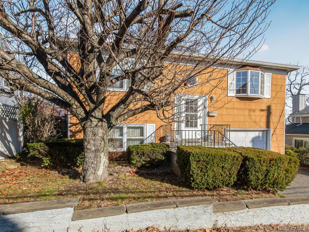 Welcome to 127 Bellevue Place, nestled in the desirable Homecrest neig...