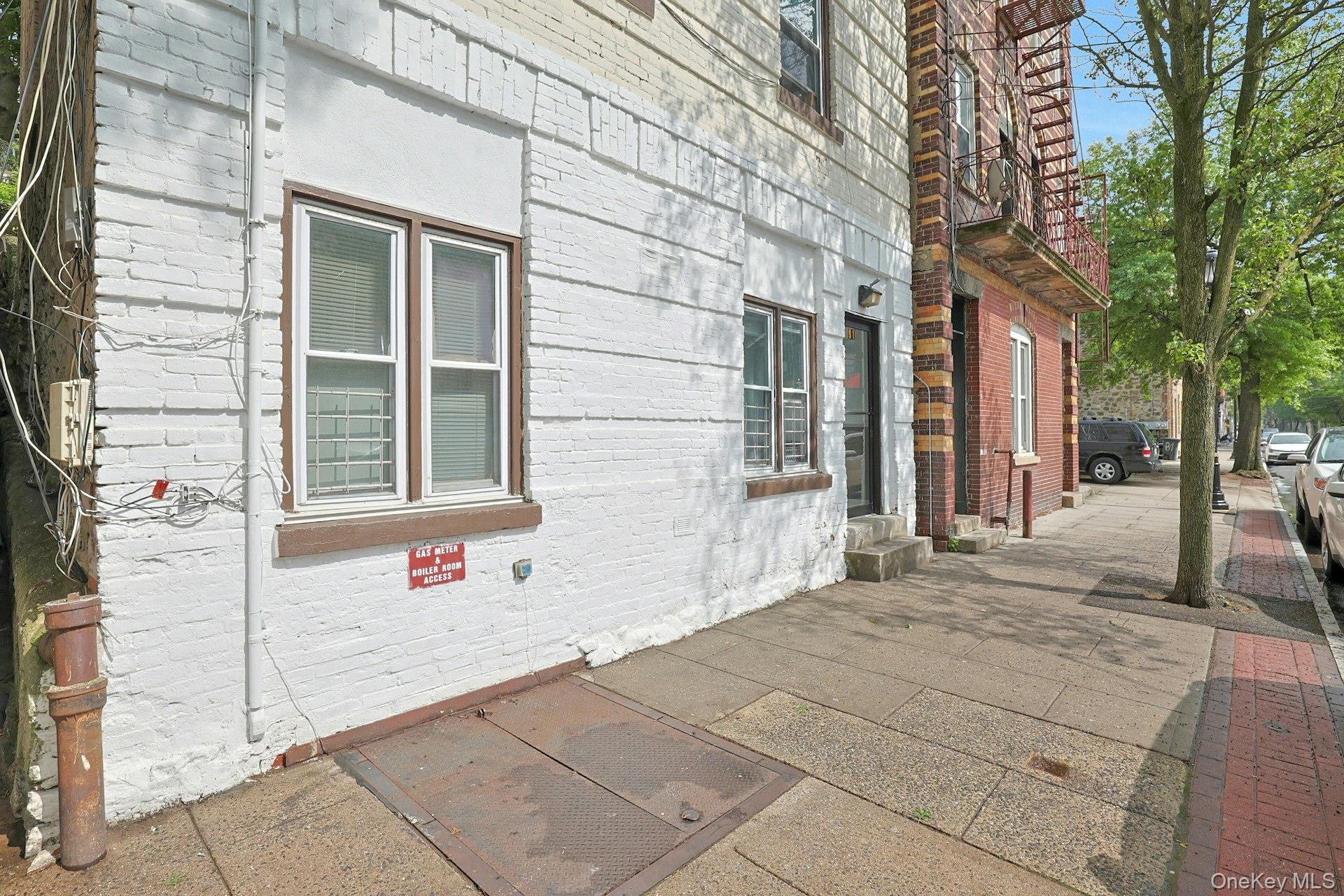 Investors take notice! This three-family property features two one-bed...