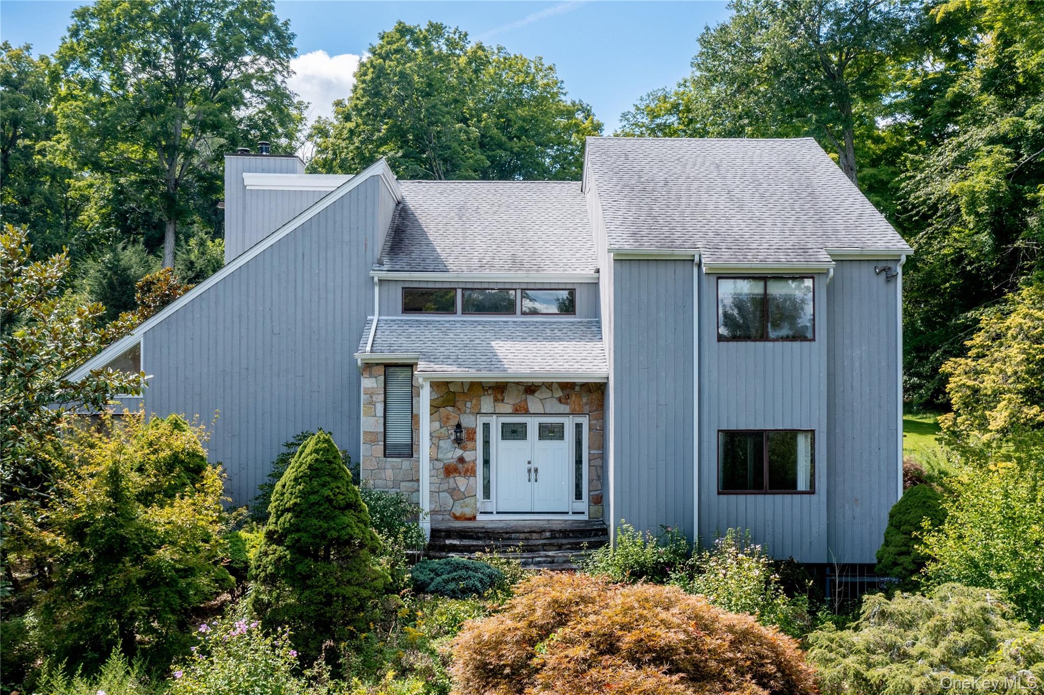Large 4 bedroom, 2.5 bathroom contemporary colonial sits on a beautifu...