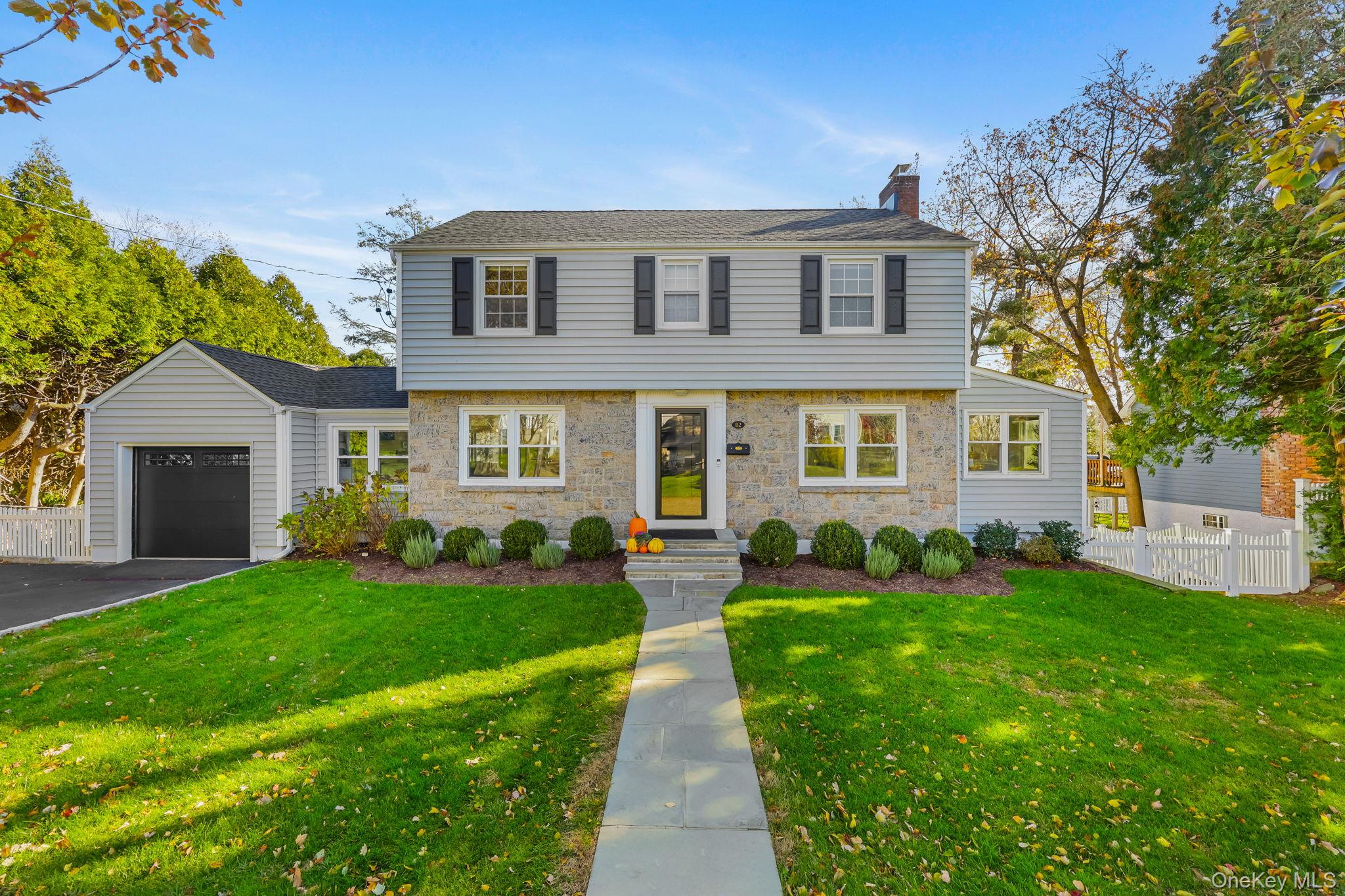 Sunny renovated stone front Colonial home offers modern amenities and...