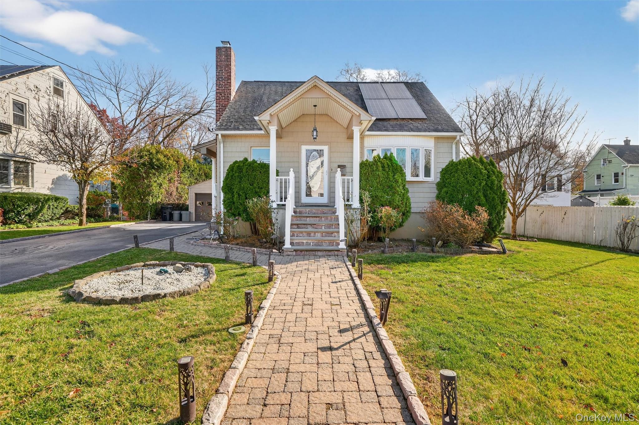 Welcome to this charming, move-in ready nestled in the heart of Elmsfo...