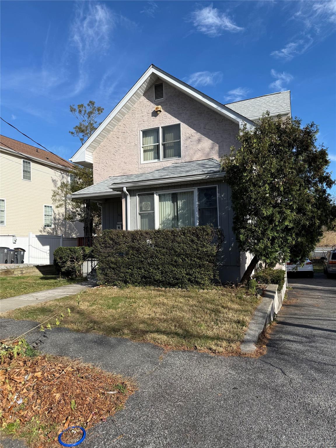 Welcome to this charming Colonial-style home, full of character and op...