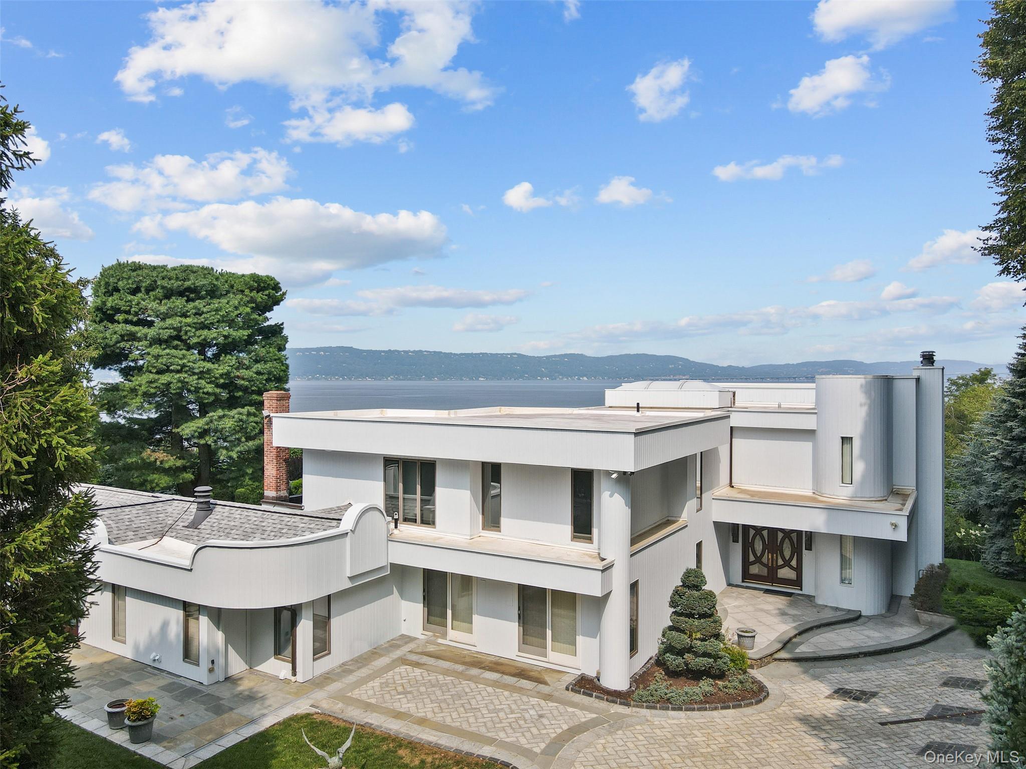 Perched above the Hudson River in the exclusive Matthiessen Park encla...