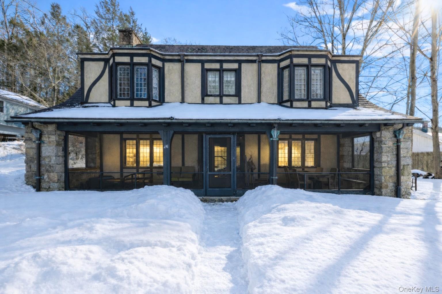 Classic 1920s Tudor charm meets everyday comfort in this 4-bedroom, 2....