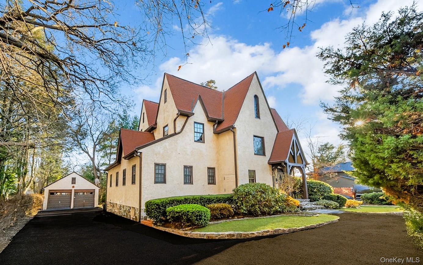 Timeless elegance abounds in this expansive Bonnie Crest Tudor set on...