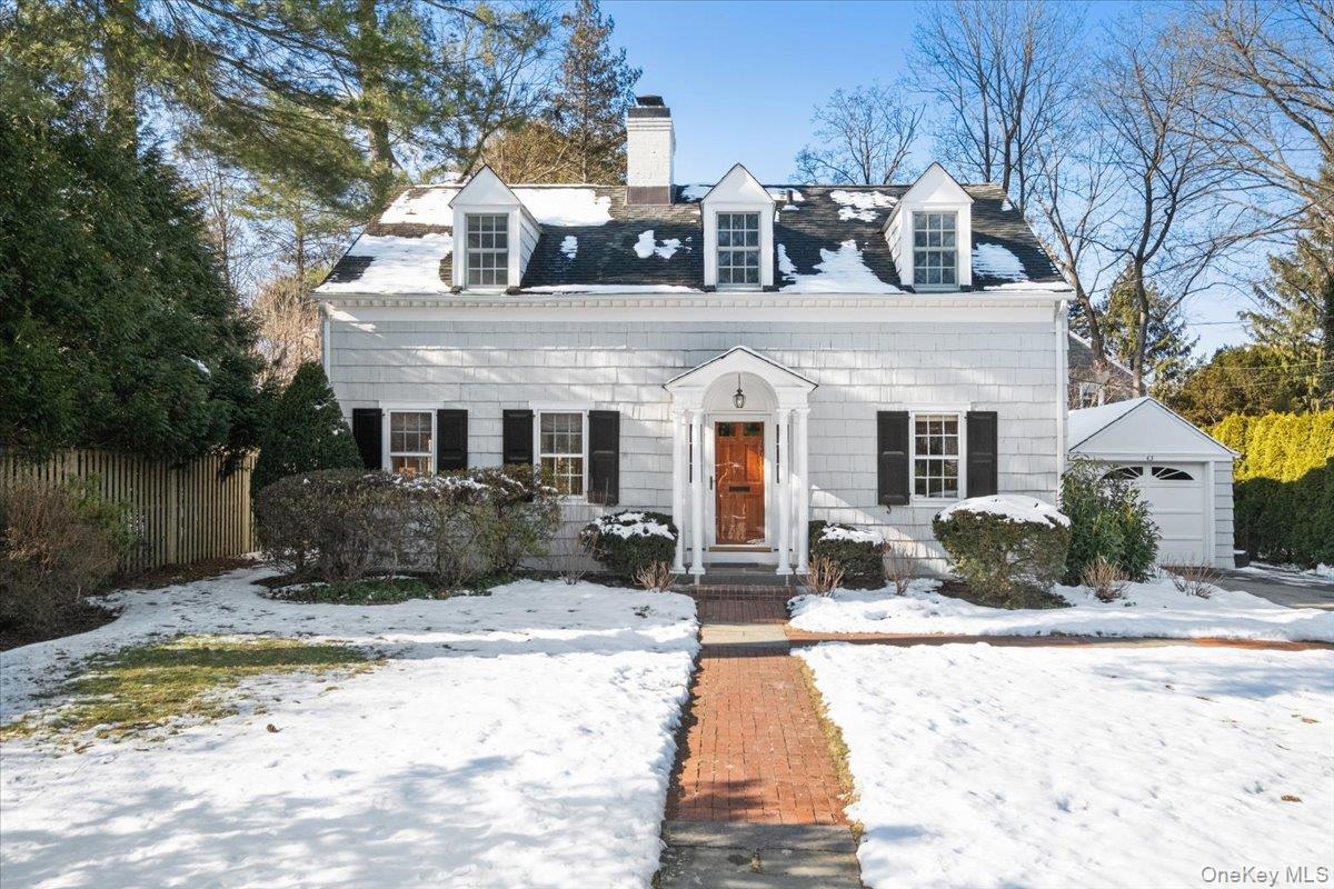 Welcome to 43 Tompkins Road—a stylish, move-in-ready Cape Cod in Scars...