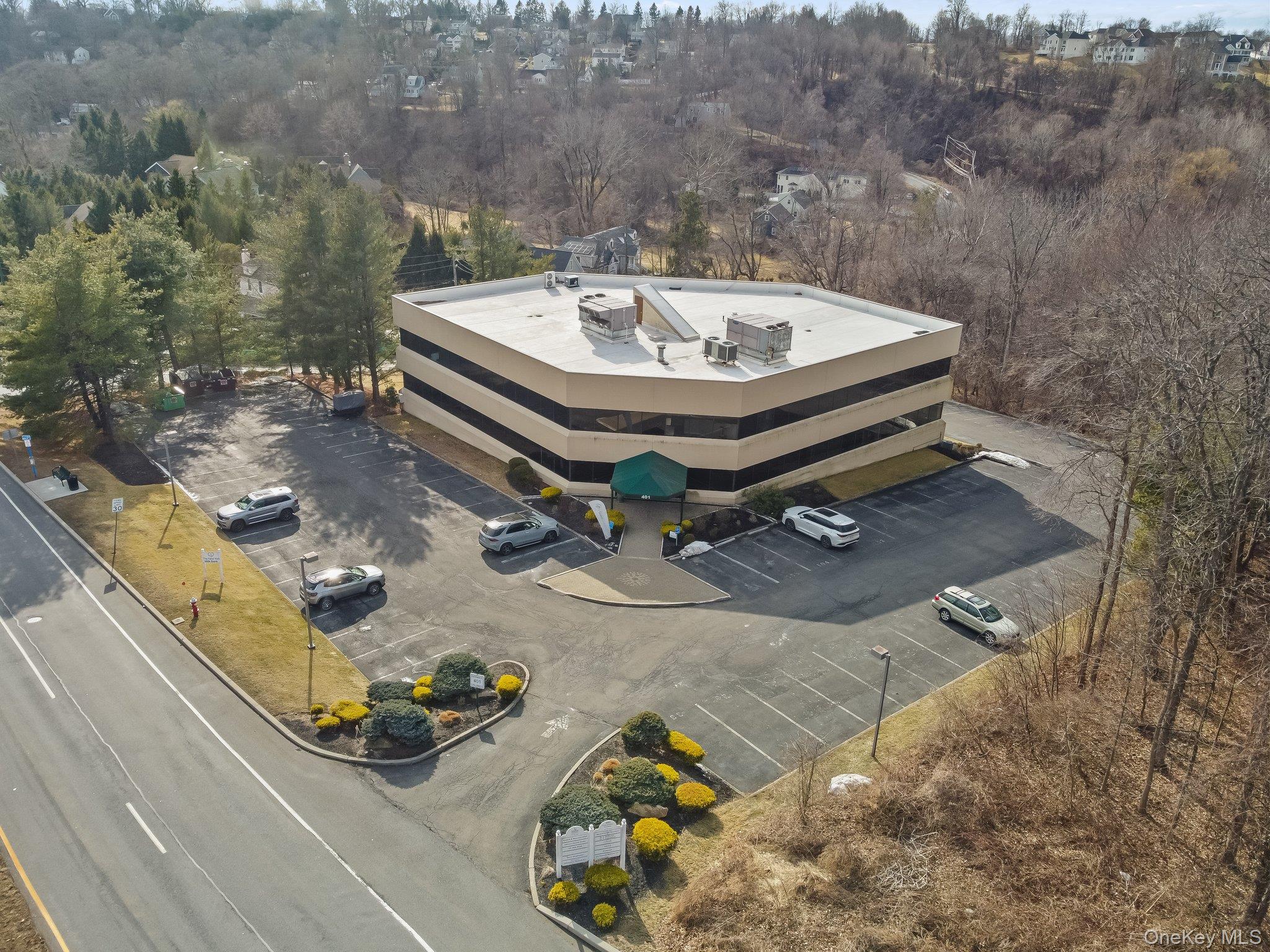 A premier three-story office building with elevator access and ample p...