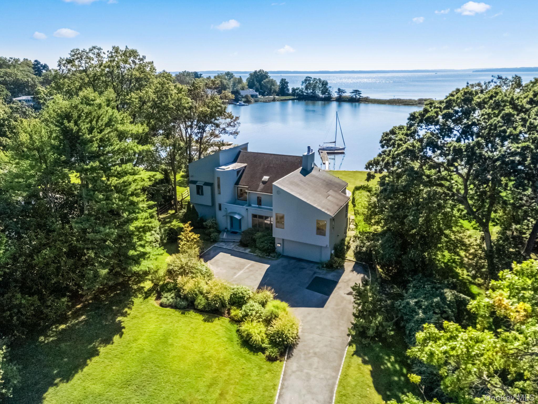 Experience exceptional waterfront living at 1180 Greacen Point Road, a...