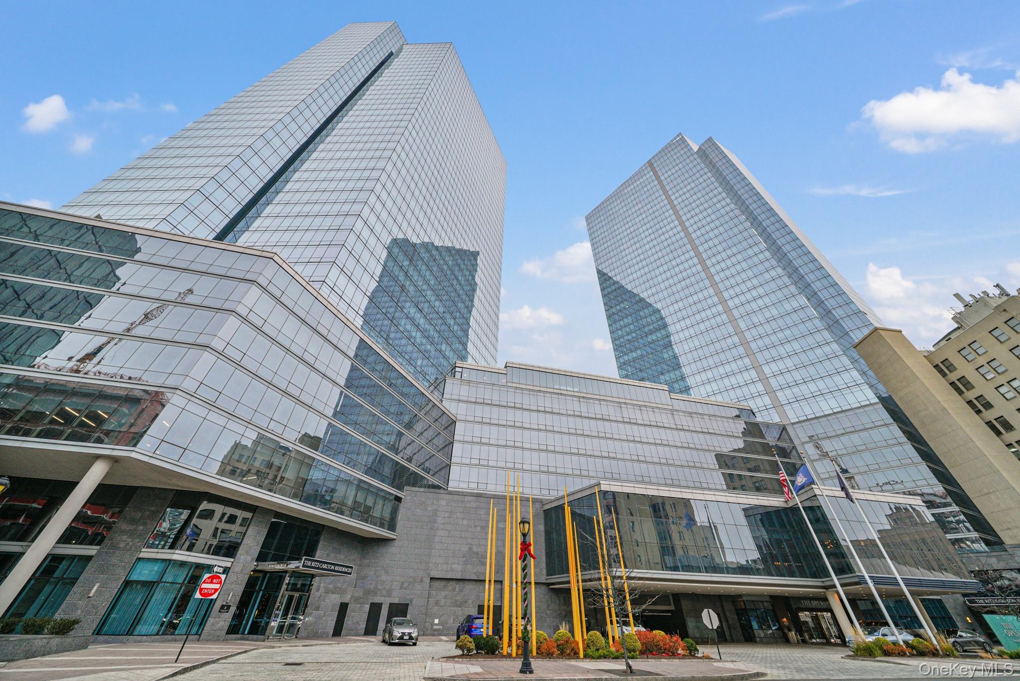 Experience modern elegance in this stunning high-rise condominium set...